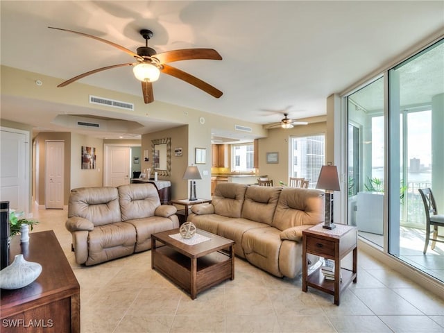 4182 Bay Beach Ln Unit 761, Fort Myers Beach, FL 33931 - living room with ceiling fan and light tile patterned floors