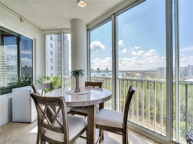 4182 Bay Beach Ln Unit 761, Fort Myers Beach, FL 33931 - sunroom featuring healthy amount of natural light and a city view