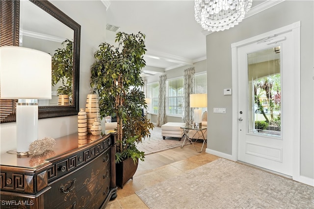 28283 Koi Way, Bonita Springs, FL 34135 - tiled foyer featuring ornamental molding and a chandelier