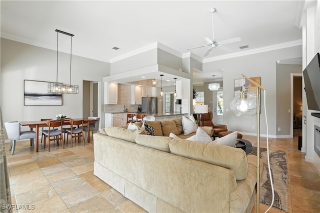 28283 Koi Way, Bonita Springs, FL 34135 - living area featuring crown molding and ceiling fan