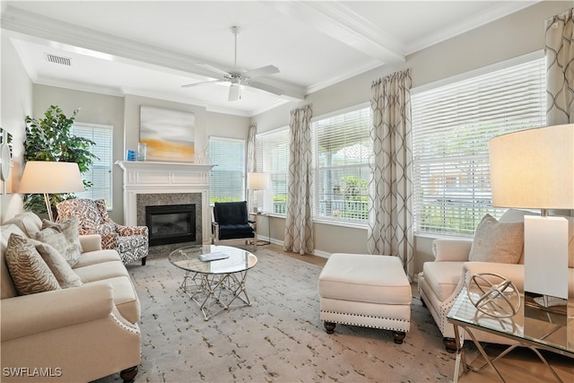 28283 Koi Way, Bonita Springs, FL 34135 - living area with crown molding, ceiling fan, a fireplace, wood finished floors, and beamed ceiling