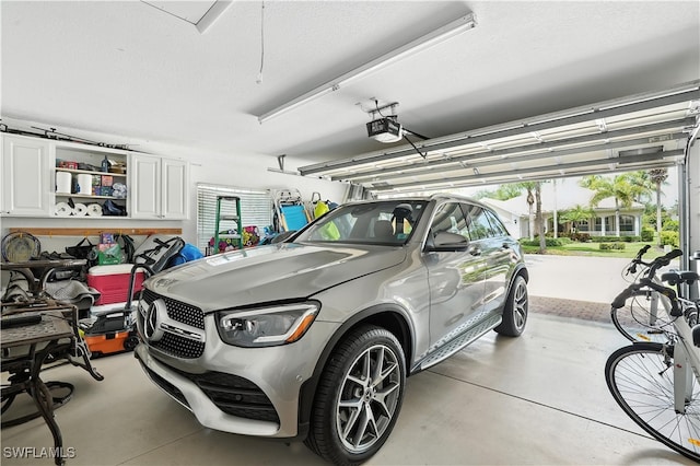 28283 Koi Way, Bonita Springs, FL 34135 - garage with a garage door opener