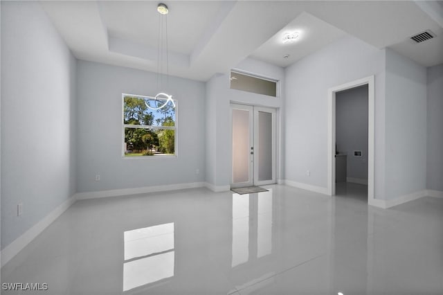 3433 66th Ave NE, Naples, FL 34120 - tiled empty room with a chandelier and baseboards