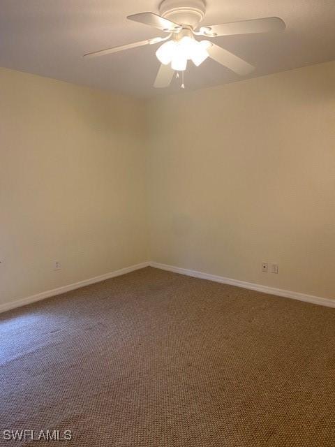 5265 Leeds Rd, Fort Myers, FL 33907 - carpeted spare room with ceiling fan and baseboards