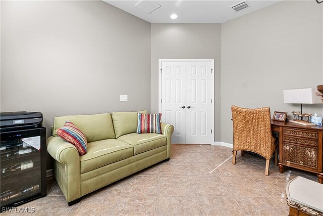 9078 Triangle Palm Ln, Fort Myers, FL 33913 - tiled home office featuring baseboards