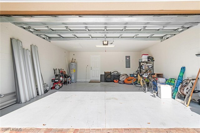 9078 Triangle Palm Ln, Fort Myers, FL 33913 - garage featuring electric water heater, electric panel, and a garage door opener