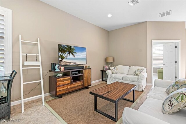 9078 Triangle Palm Ln, Fort Myers, FL 33913 - tiled living room with baseboards and recessed lighting