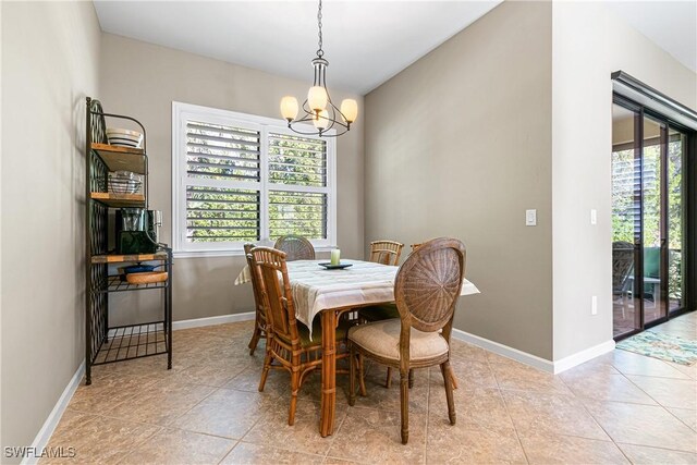 9078 Triangle Palm Ln, Fort Myers, FL 33913 - dining space featuring a chandelier and light tile patterned floors