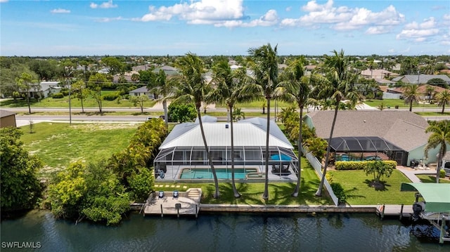 606 Mohawk Pkwy, Cape Coral, FL 33914 - aerial perspective of suburban area featuring a large body of water and a pool