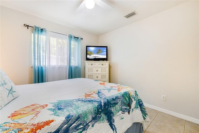 606 Mohawk Pkwy, Cape Coral, FL 33914 - bedroom with light tile patterned floors, ceiling fan, and lofted ceiling