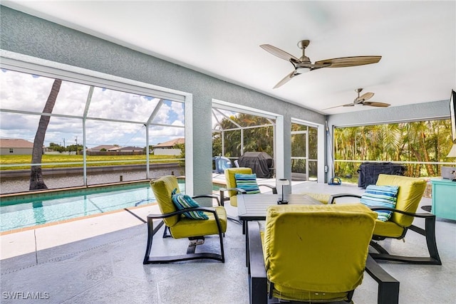 606 Mohawk Pkwy, Cape Coral, FL 33914 - view of patio featuring an outdoor pool, area for grilling, a ceiling fan, and a lanai