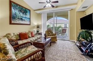 4105 Residence Dr Unit 722, Fort Myers, FL 33901 - living room featuring a ceiling fan