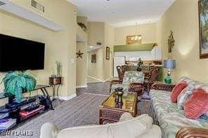 4105 Residence Dr Unit 722, Fort Myers, FL 33901 - living room featuring baseboards