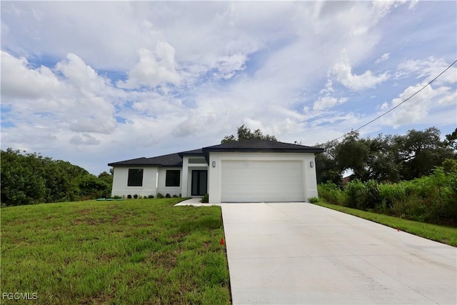 2713 8th St W, Lehigh Acres, FL 33971 - view of front of property with driveway, stucco siding, a garage, and a front yard