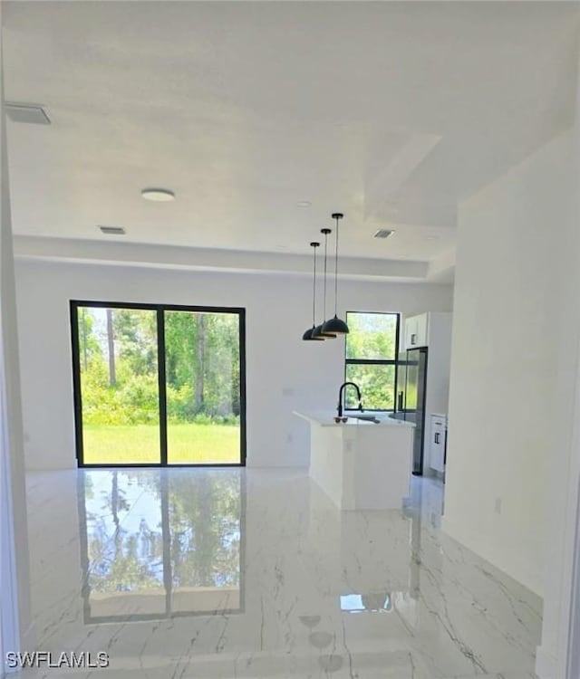 3113 58th St W, Lehigh Acres, FL 33971 - unfurnished room with light marble finish floors