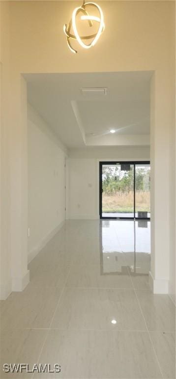 1215 Bayou St, Lehigh Acres, FL 33974 - unfurnished room with light tile patterned floors and baseboards