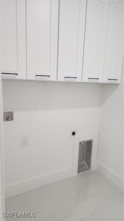 1215 Bayou St, Lehigh Acres, FL 33974 - washroom with cabinet space, hookup for a washing machine, and hookup for an electric dryer