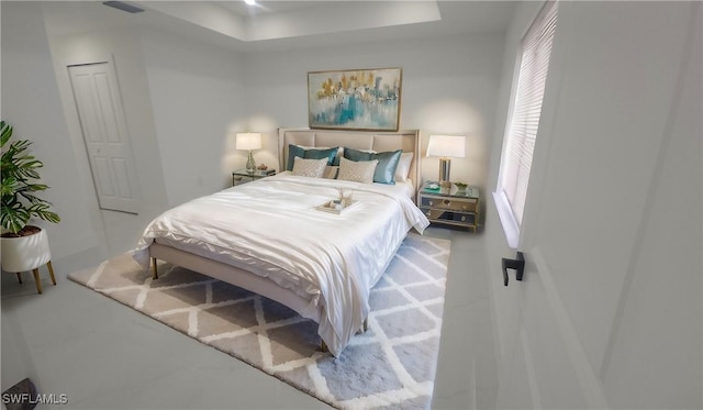 1215 Bayou St, Lehigh Acres, FL 33974 - bedroom featuring a raised ceiling