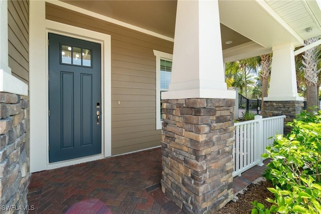 3240 Pilot Cir, Naples, FL 34120 - entrance to property featuring covered porch
