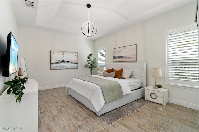 3240 Pilot Cir, Naples, FL 34120 - bedroom featuring wood finish floors and baseboards