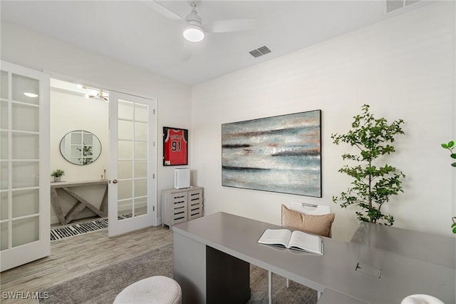 3240 Pilot Cir, Naples, FL 34120 - office area featuring french doors, wood finished floors, and ceiling fan