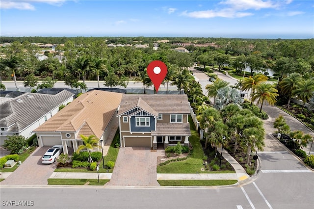 3240 Pilot Cir, Naples, FL 34120 - aerial perspective of suburban area featuring a tree filled landscape
