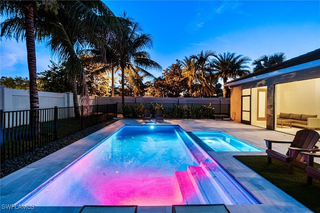 3240 Pilot Cir, Naples, FL 34120 - view of pool with a fenced backyard and a pool with connected hot tub
