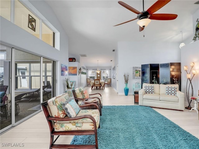 14891 Lake Olive Dr, Fort Myers, FL 33919 - living area featuring wood finished floors and ceiling fan