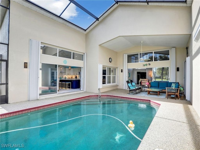 14891 Lake Olive Dr, Fort Myers, FL 33919 - outdoor pool featuring an outdoor living space and a patio area