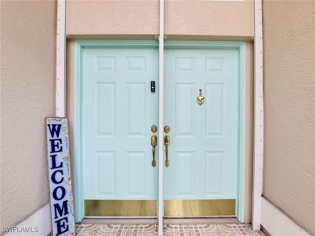 14891 Lake Olive Dr, Fort Myers, FL 33919 - entrance to property with stucco siding