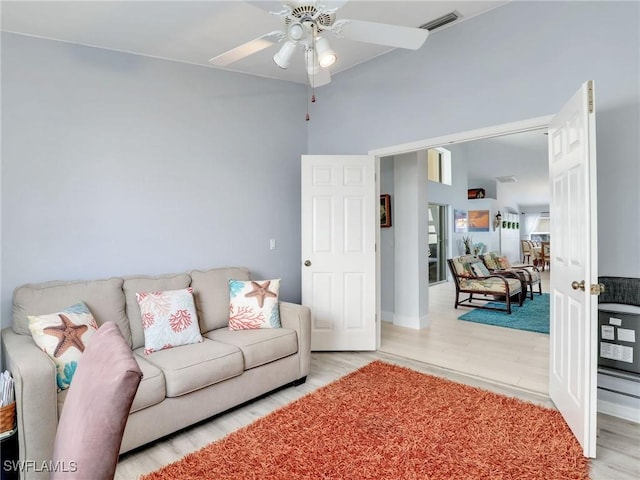 14891 Lake Olive Dr, Fort Myers, FL 33919 - living area featuring light wood finished floors and a ceiling fan