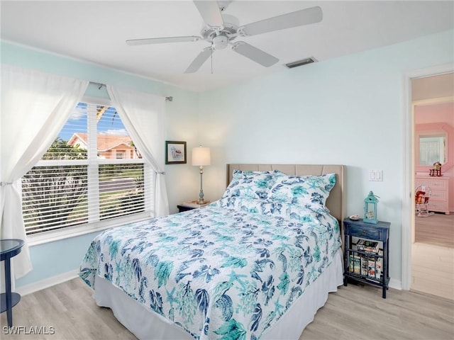 14891 Lake Olive Dr, Fort Myers, FL 33919 - bedroom featuring wood finished floors and ceiling fan