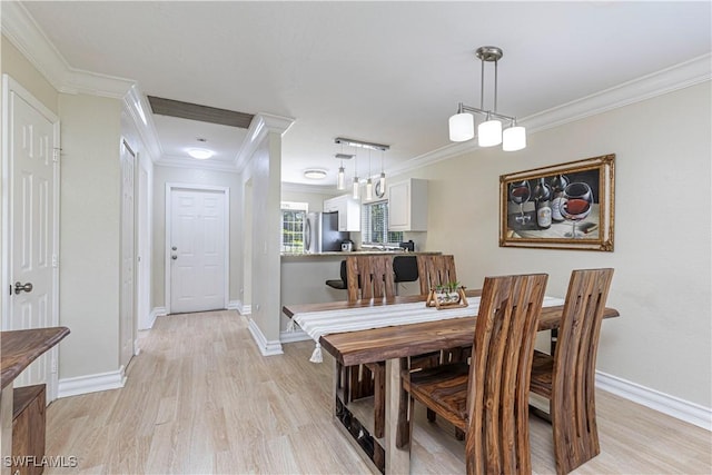 1271 16th St NE, Naples, FL 34120 - dining room with ornamental molding and light wood finished floors