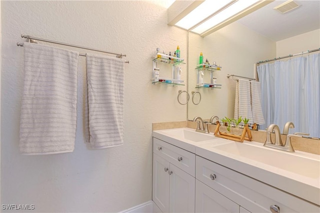 1271 16th St NE, Naples, FL 34120 - full bathroom with double vanity