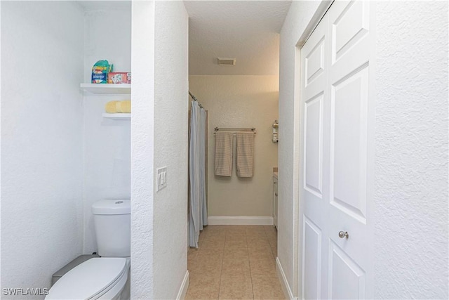 1271 16th St NE, Naples, FL 34120 - bathroom with tile patterned flooring and a shower with shower curtain