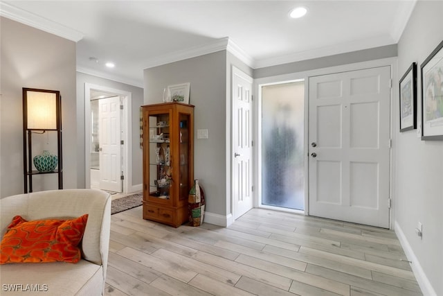 1015 El Valle Ave, Fort Myers, FL 33919 - foyer with light wood-type flooring, crown molding, and recessed lighting