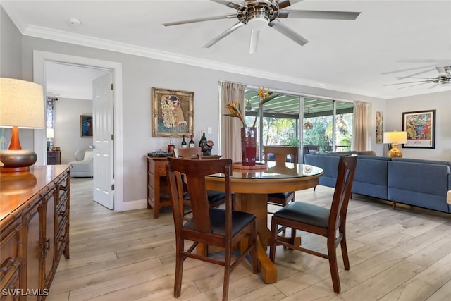 1015 El Valle Ave, Fort Myers, FL 33919 - dining space with a ceiling fan, light wood-style floors, and crown molding