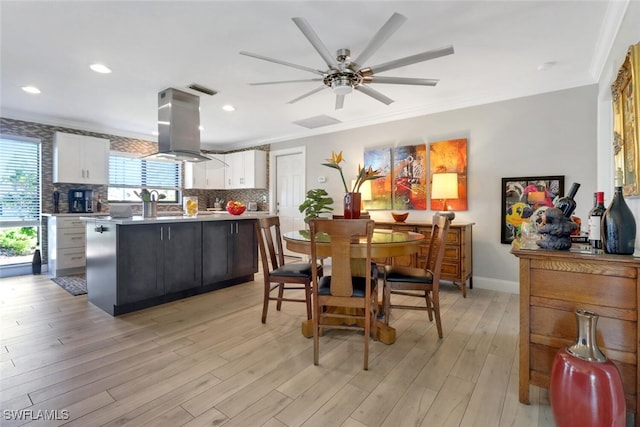 1015 El Valle Ave, Fort Myers, FL 33919 - dining area featuring ornamental molding, ceiling fan, recessed lighting, and light wood-style flooring