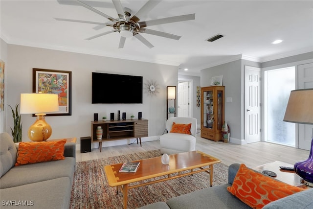 1015 El Valle Ave, Fort Myers, FL 33919 - living area with light wood finished floors, ornamental molding, ceiling fan, and recessed lighting