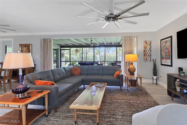 1015 El Valle Ave, Fort Myers, FL 33919 - living area with a ceiling fan, wood finished floors, and crown molding