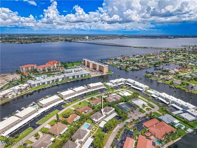 4217 SE 19th Ave Unit 110, Cape Coral, FL 33904 - aerial perspective of suburban area featuring a large body of water