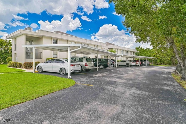 4217 SE 19th Ave Unit 110, Cape Coral, FL 33904 - view of covered parking lot