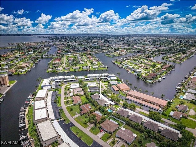 4217 SE 19th Ave Unit 110, Cape Coral, FL 33904 - aerial perspective of suburban area featuring a nearby body of water