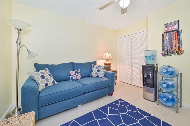 4217 SE 19th Ave Unit 110, Cape Coral, FL 33904 - tiled living room with a ceiling fan