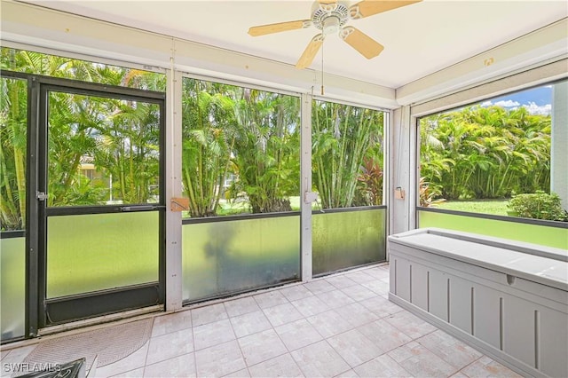 4217 SE 19th Ave Unit 110, Cape Coral, FL 33904 - unfurnished sunroom featuring a ceiling fan and plenty of natural light