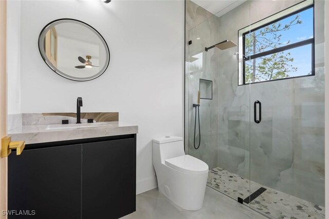 3614 22nd Ave NE, Naples, FL 34120 - bathroom featuring a stall shower, vanity, a ceiling fan, and tile patterned flooring