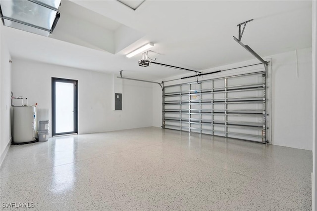 3614 22nd Ave NE, Naples, FL 34120 - garage with a garage door opener, electric water heater, and electric panel