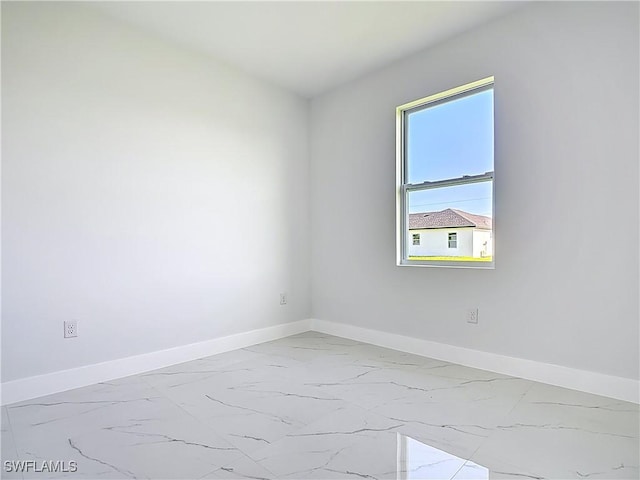 5001 Bywood St, Lehigh Acres, FL 33971 - unfurnished room featuring marble finish flooring