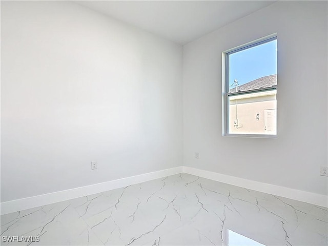 5001 Bywood St, Lehigh Acres, FL 33971 - spare room with marble look tiles
