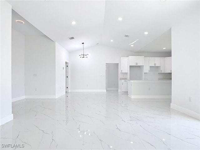 5001 Bywood St, Lehigh Acres, FL 33971 - unfurnished living room with light marble finish flooring, lofted ceiling, recessed lighting, and a chandelier